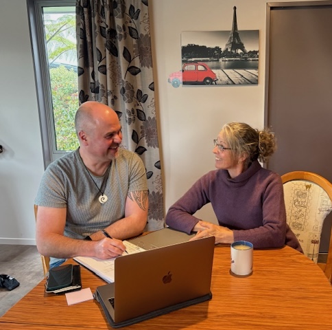 Chef precisely chopping fresh carrots for meal preparation